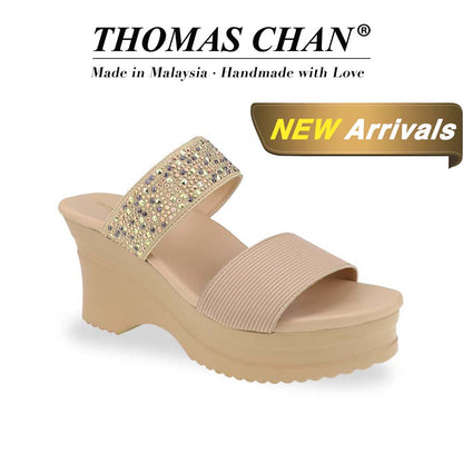 Diagonal view of Thomas Chan's Strappy Rhinestone Cushioned Heels in cream: With a built-in cushioned footbed and a chic two-strap design, these heels offer a sleek front stripe complemented by a dazzling rhinestone strap at the back."THOMAS CHAN®" brand displayed with "Made in Malaysia · Handmade with Love" below. Gold and white banner highlights special offer: "New Arrival"