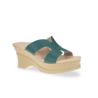 Diagonal view of Thomas Chan's H-Strap Cushioned Heels in green color: Crafted for all-day comfort, these sandals boast built-in cushioned insoles and are made from microfiber leather with a pebbled texture.