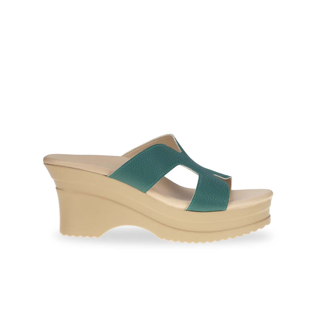 Side view of Thomas Chan's H-Strap Cushioned Heels in green color: Crafted for all-day comfort, these sandals boast built-in cushioned insoles and are made from microfiber leather with a pebbled texture.