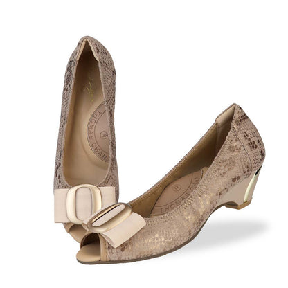 Full view of Thomas Chan's Vintage Print Pumps with Ribbon Buckle in light apricot color, featuring an arch-support footbed.