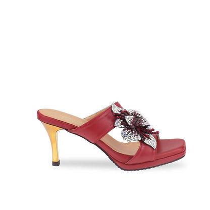 Side view of Thomas Chan's Embellished Flower High Heeled Sandals in red, highlighting the intricately adorned floral decorations and a sophisticated 3-inch gold stiletto heel, set against a clean, white backdrop.