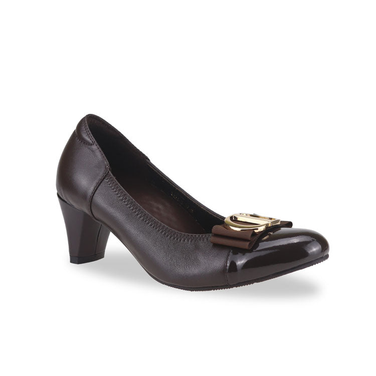 Diagonal view of Thomas Chan dark brown-colored ribbon buckle court shoes, featuring patent dark brown detail at the toe cover.