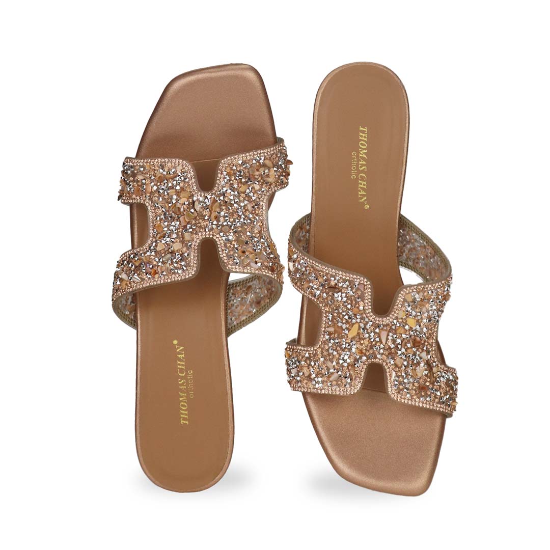 Front view of Thomas Chan's Sparkle Jewel H-Strap Heeled Sandals in bronze, showcasing an elegant design and a uniquely crafted heel.