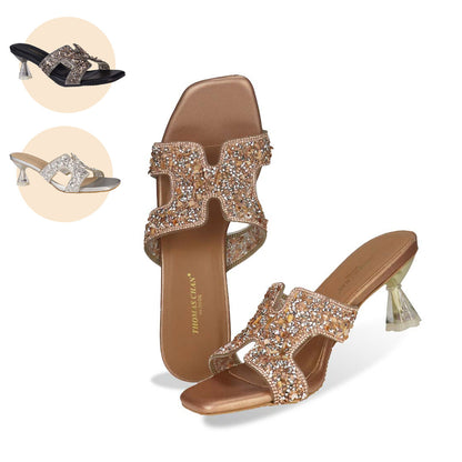 Thomas Chan's Sparkle Jewel H-Strap Heeled Sandals in bronze, featuring an elegant design and a uniquely crafted heel. Also available in black and silver.