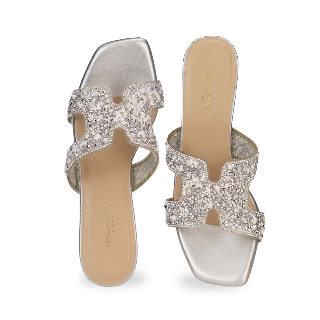 Front view of Thomas Chan's Sparkle Jewel H-Strap Heeled Sandals in silver, showcasing an elegant design and a uniquely crafted heel.