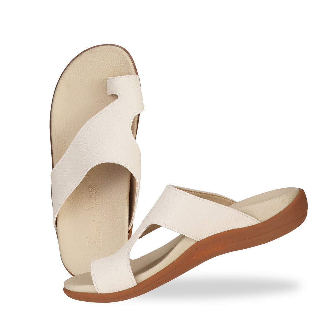 Full view of Thomas Chan's Simple Toe Strap Flat Sandals in ivory, displaying an elegant design with an arch-support footbed.