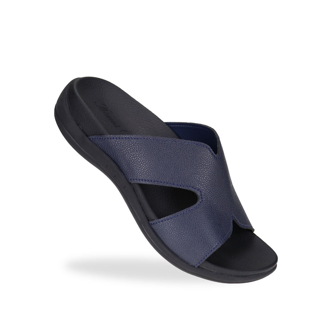 Diagonal view of blue colour Ultra Comfort Matte Leather Sandals by Thomas Chan, featuring a simple design and arch-supporting soft insole.