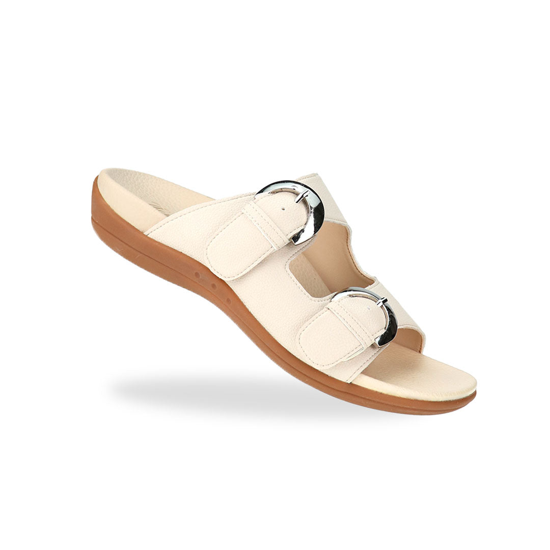 Diagonal view of Thomas Chan's Duo Buckle Slide-One Flat Sandals in ivory, displaying an elegant design with an arch-support footbed.