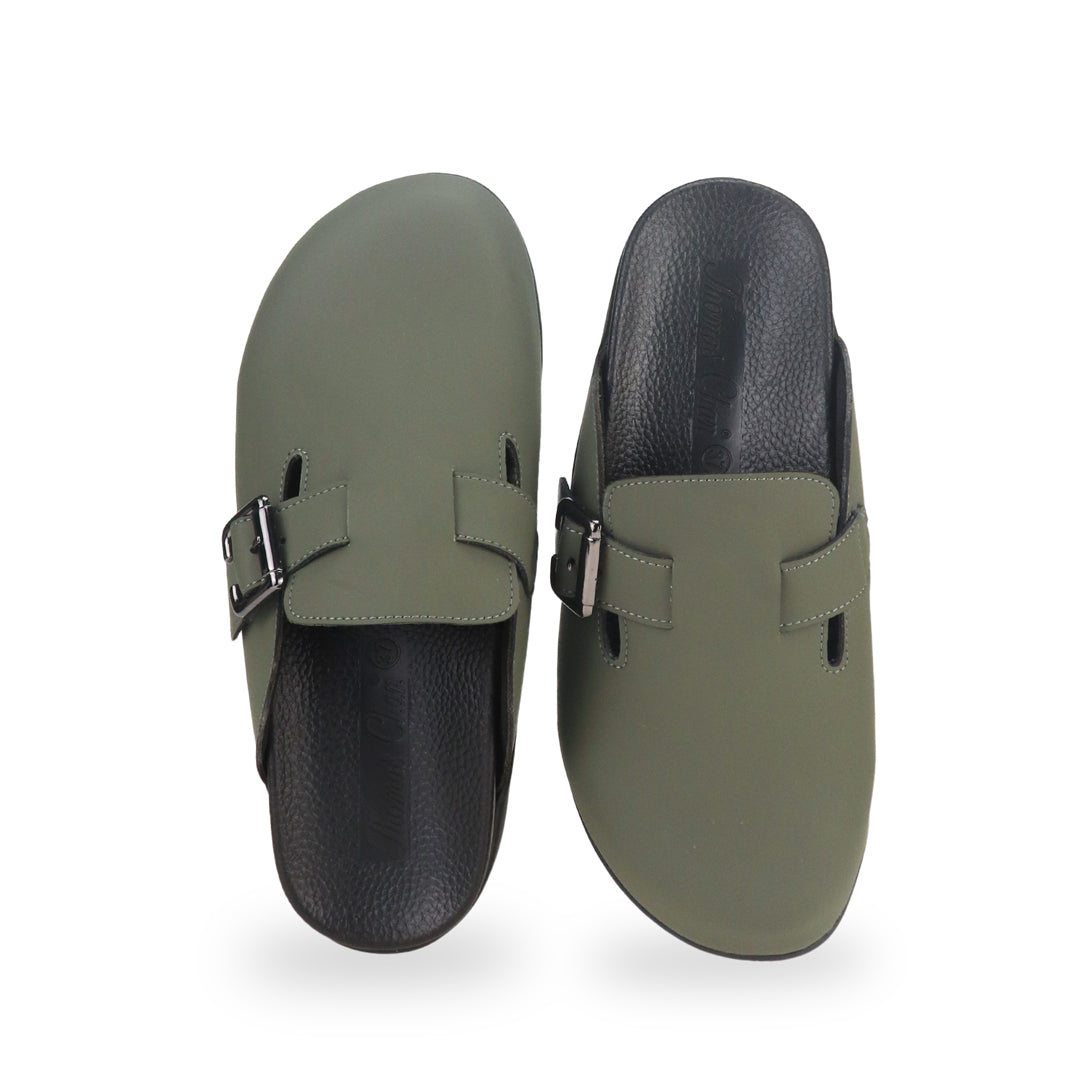 Front view of Thomas Chan's closed-toe buckle sandals in khaki colour, the sandals feature a sleek design with a black buckle strap across the top and a black inner lining, with arch-support footbed.