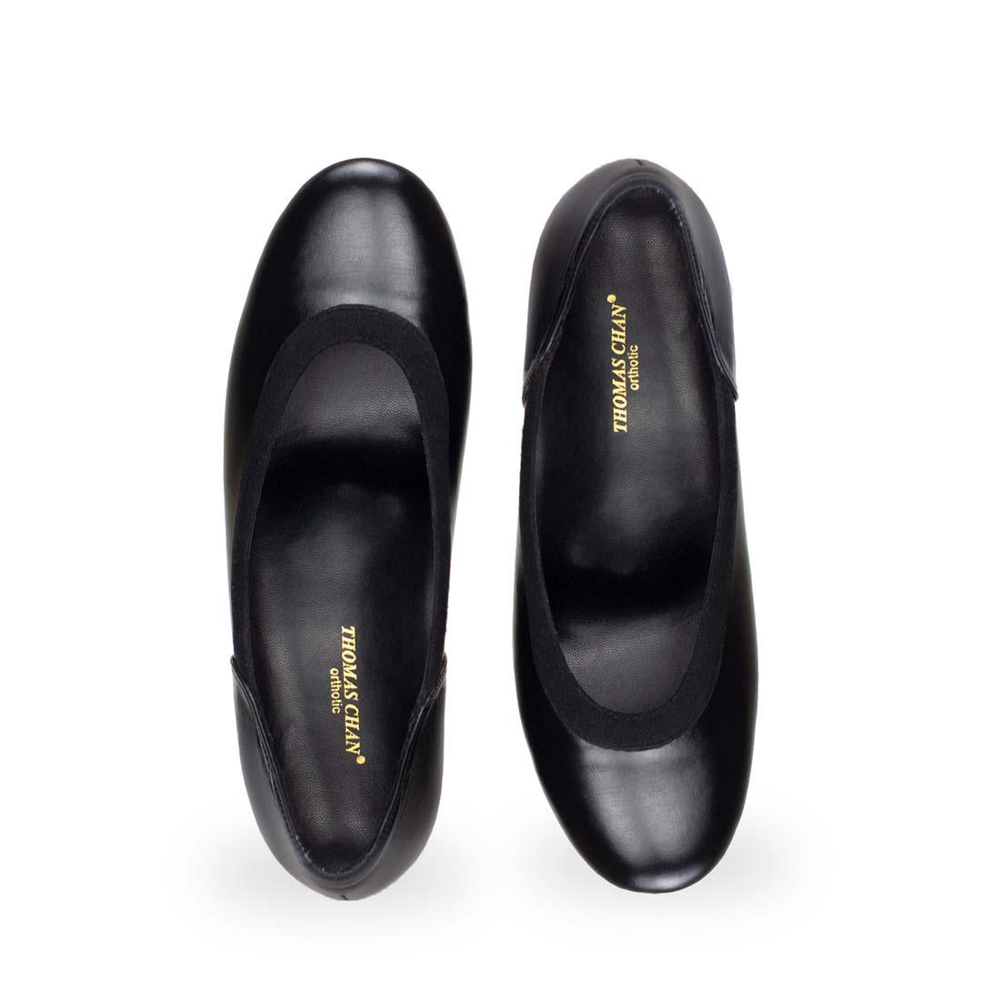 Front view of Thomas Chan court shoes crafted with black suede ox leather, complete with an arch-support orthotic insole included, ensuring both comfort and a more breathable experience.