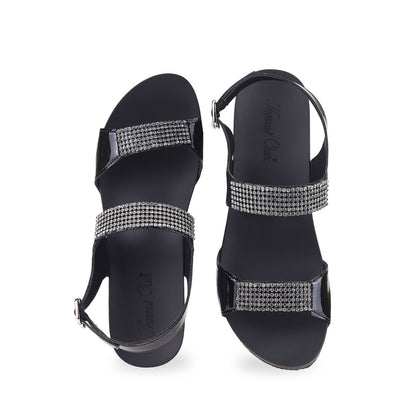 Front view of Thomas Chan black Diamond Strappy Slingback Low Wedges, featuring handpicked multi-row rhinestone straps and the exclusive Thomas Chan® Orthotic Arch-legance footbed for stylish comfort, complete with a breathable slingback design.