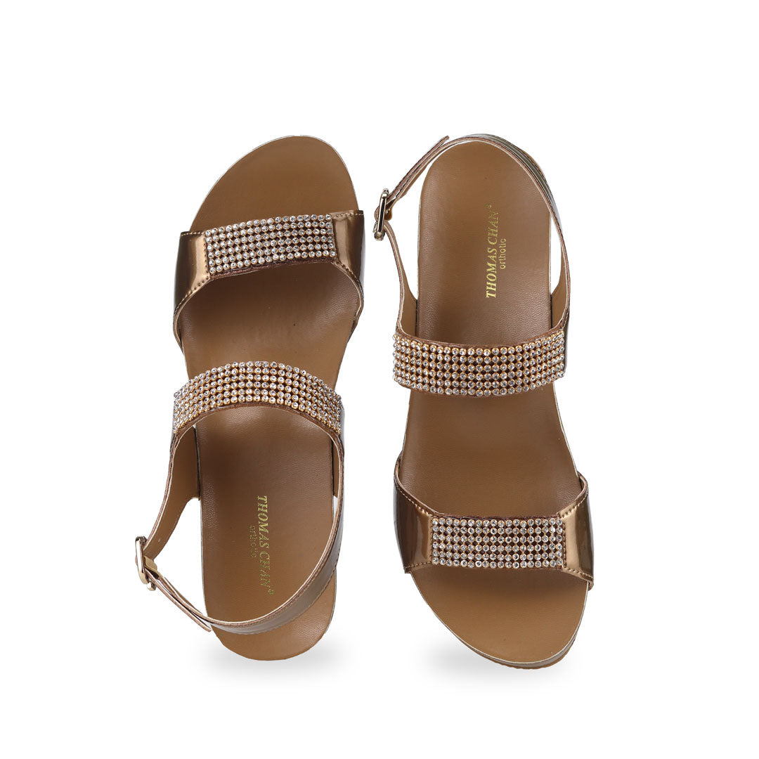 Front view of Thomas Chan bronze Diamond Strappy Slingback Low Wedges, featuring handpicked multi-row rhinestone straps and the exclusive Thomas Chan® Orthotic Arch-legance footbed for stylish comfort, complete with a breathable slingback design.