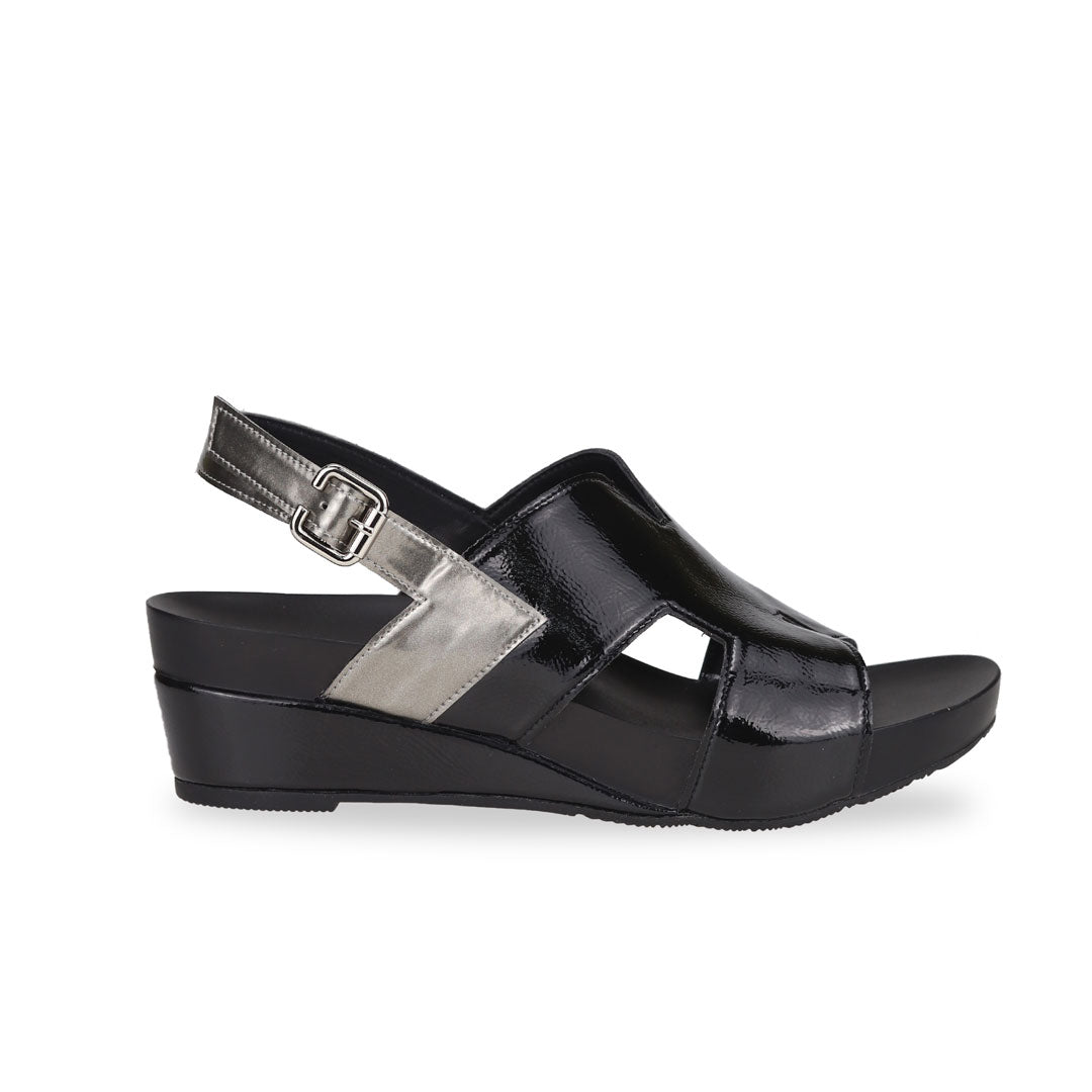 Side view of Thomas Chan H-Strap with Slingback Low Wedge Sandals in black, featuring a mixture of silver patent at the slingback, ensuring comfortable wear and an easy walking experience.