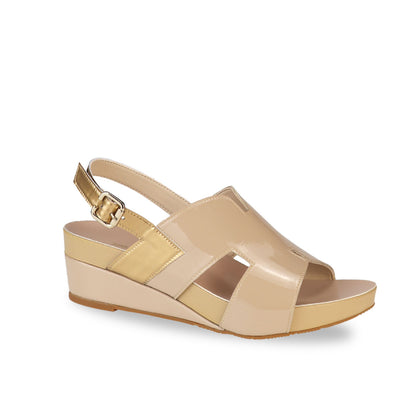 Diagonal view of Thomas Chan H-Strap with Slingback Low Wedge Sandals in cream, featuring a mixture of silver patent at the slingback, ensuring comfortable wear and an easy walking experience.