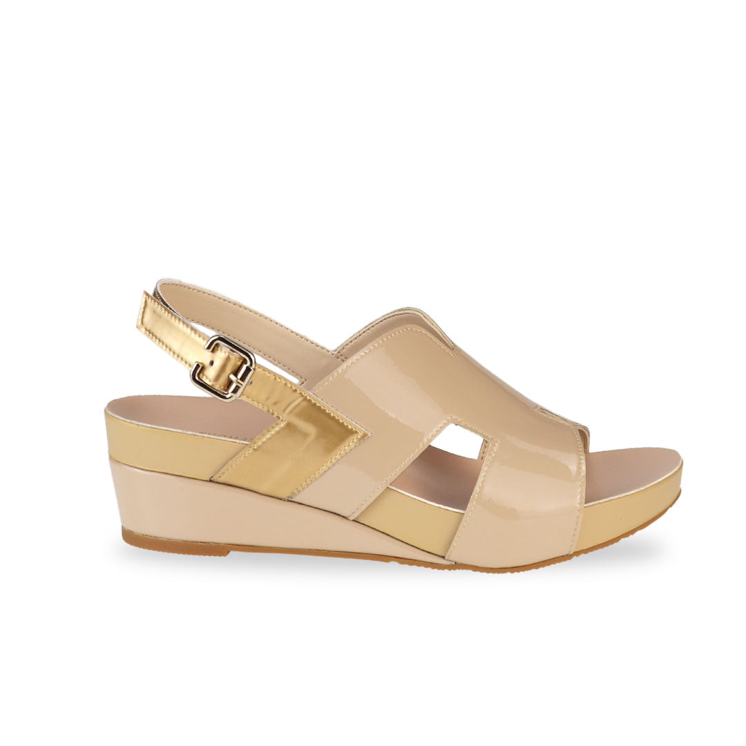 Side view of Thomas Chan H-Strap with Slingback Low Wedge Sandals in cream, featuring a mixture of silver patent at the slingback, ensuring comfortable wear and an easy walking experience.