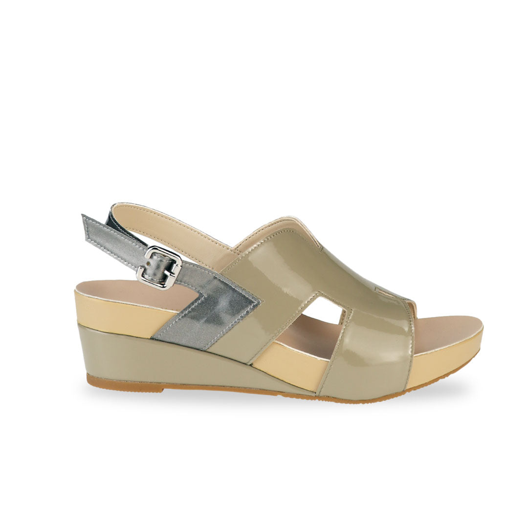 Side view of Thomas Chan H-Strap with Slingback Low Wedge Sandals in ivory green, featuring a mixture of silver patent at the slingback, ensuring comfortable wear and an easy walking experience.