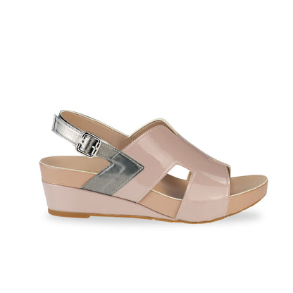 Side view of Thomas Chan H-Strap with Slingback Low Wedge Sandals in light taupe, featuring a mixture of silver patent at the slingback, ensuring comfortable wear and an easy walking experience.