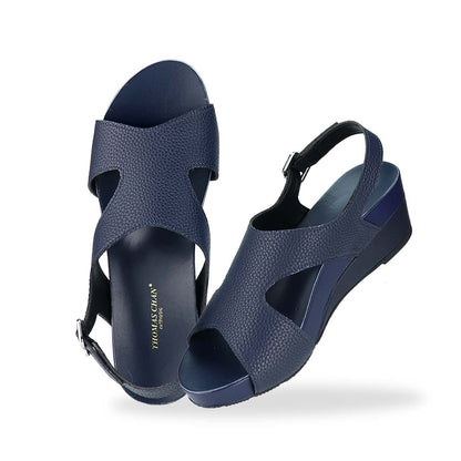 Full view of Thomas Chan Daily Wear Slingback Low Wedges in navy blue, featuring buckle slingback design, and built-in arch-support insoles for enhanced comfort and ease of walking