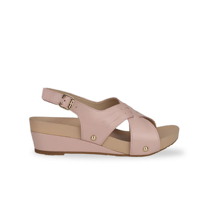 Side view of Thomas Chan Cross Strap Slingback Low Wedge Sandals in pink, featuring built-in arch-support insoles for enhanced comfort and ease of walking