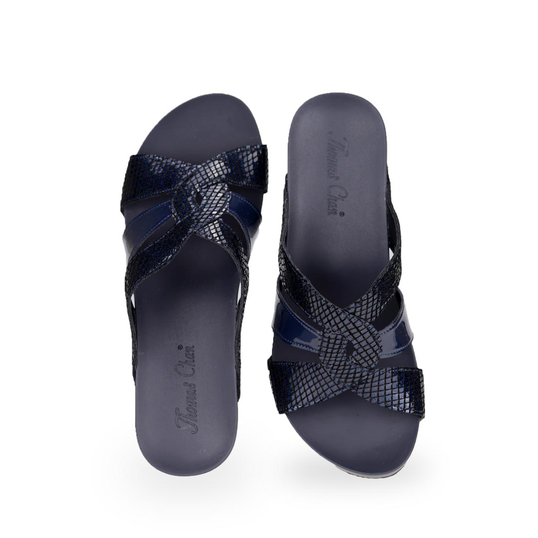 Front view of Thomas Chan dark blue coloured extra comfortable triple strap snake effect orthotic wedge sandals.