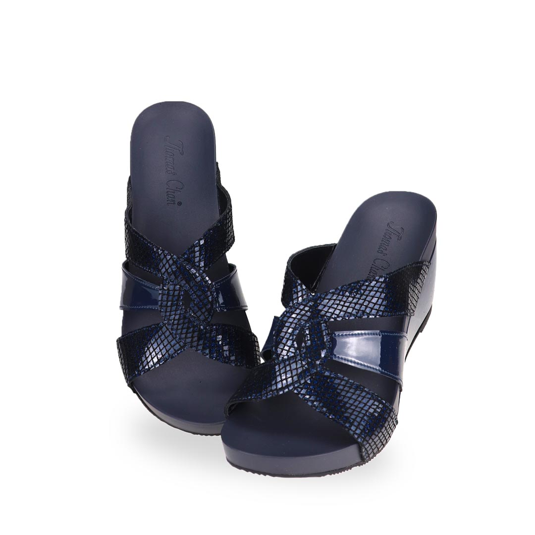 Full view of Thomas Chan dark blue coloured extra comfortable triple strap snake effect orthotic wedge sandals.