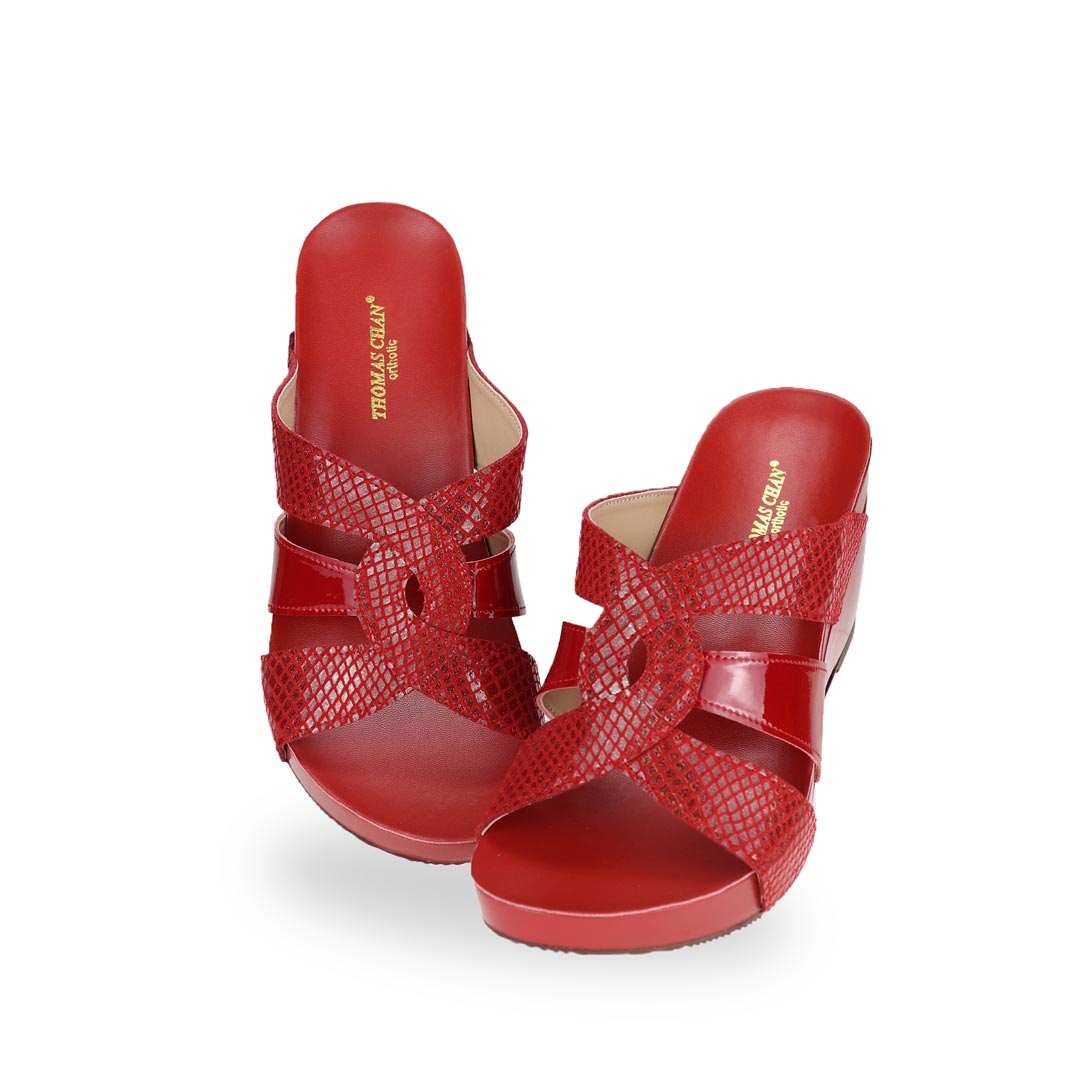 Full view of Thomas Chan classic bright red coloured extra comfortable triple strap snake effect orthotic wedge sandals.