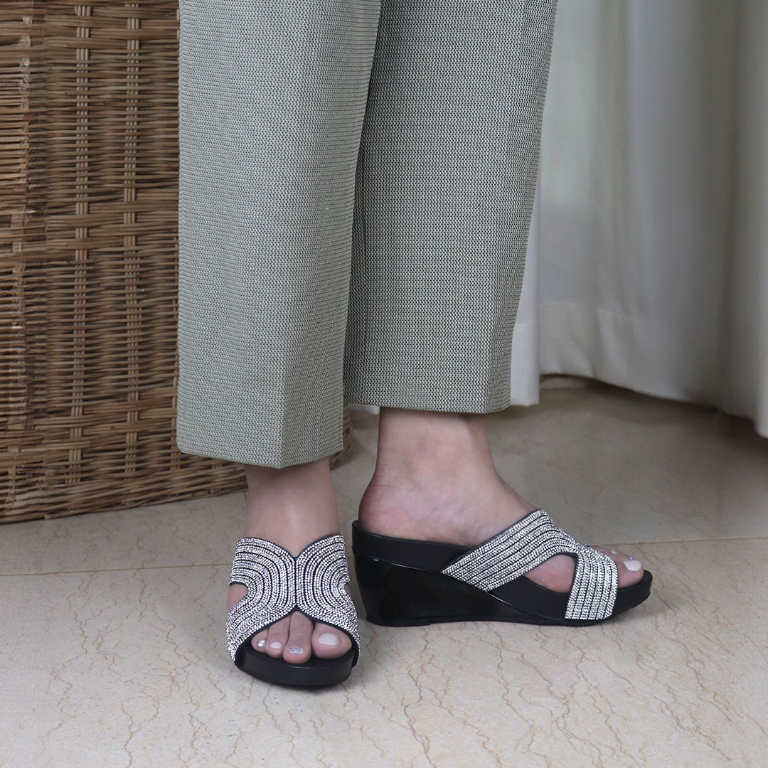 Model wearing Thomas Chan luxury black diamond-detail wedge sandals: Perfect for upscale dinner events, providing both style and comfort sandals high heels. Pair with daily outfit.