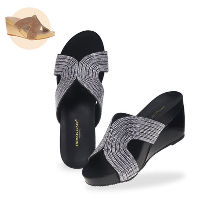 Thomas Chan Glow Diamond Detail Wedges integrated Thomas Chan® Orthotic Arch-legance footbed, ensuring a comfortable fit that lasts all day. Available in black and gold