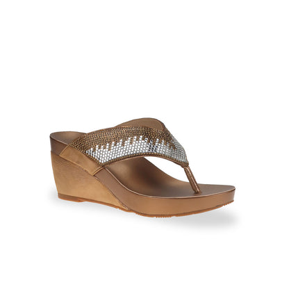 Diagonal view of Thomas Chan Suede Rhinestone Wedge Flip Flops in bronze colour: Elevate your casual look with a touch of sparkle and comfort. These chic wedge flip flops, adorned with rhinestones, are perfect for adding a hint of glamour to your summer ensemble.