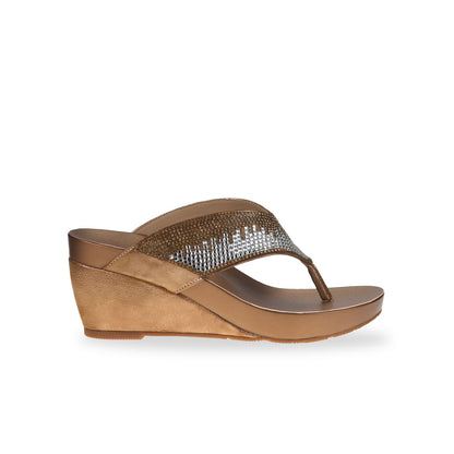 Side view of Thomas Chan Suede Rhinestone Wedge Flip Flops in bronze colour: Elevate your casual look with a touch of sparkle and comfort. These chic wedge flip flops, adorned with rhinestones, are perfect for adding a hint of glamour to your summer ensemble.