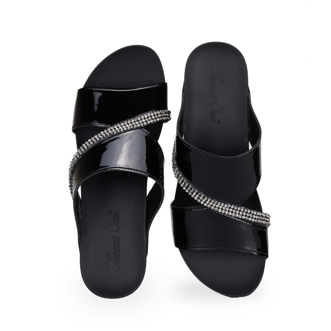 Front view of black colour Thomas Chan comfortable diamond strap shiny dinner wedge sandals.