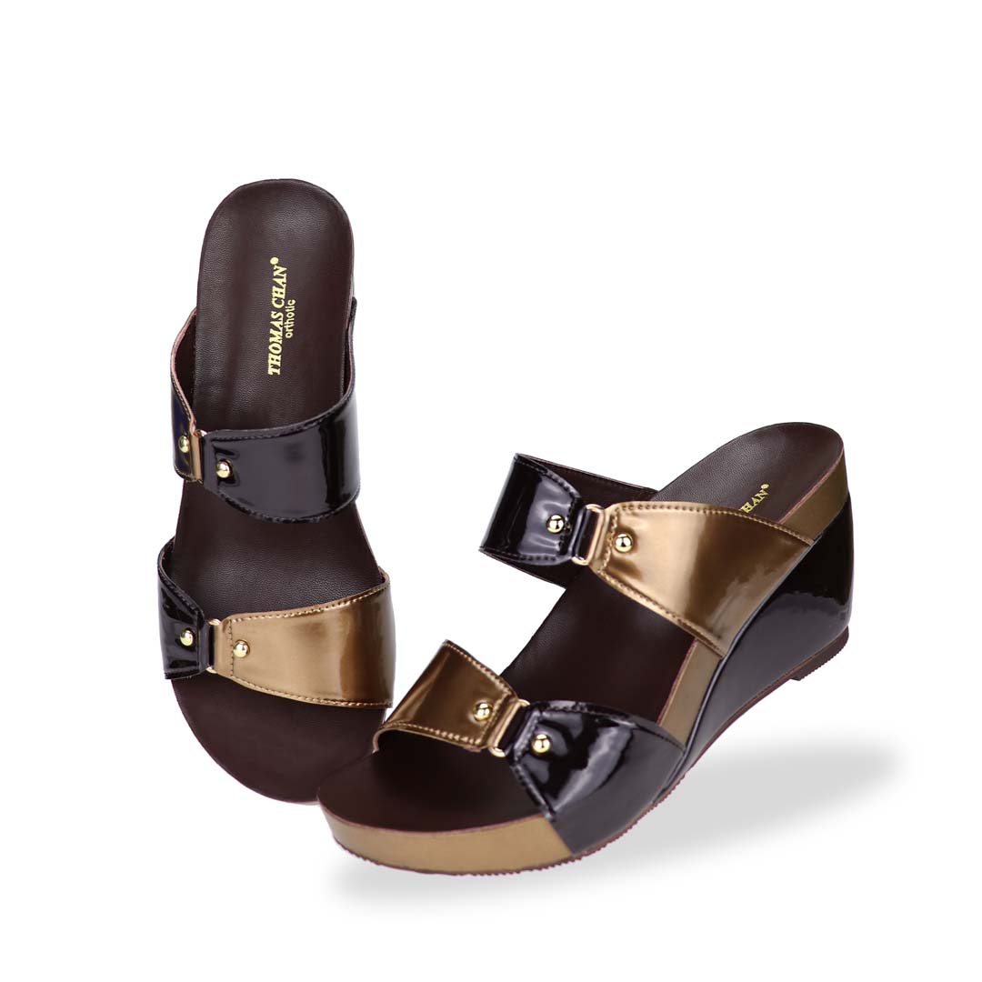 Full view of chocolate and bronze colour Thomas Chan contrast colour matching studded high wedge sandals with orthotic insoles.