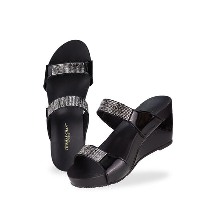 Full view of Thomas Chan black colour Multi-Row Diamond Wedge Sandals, adorned with handpicked multi-row diamond straps and Thomas Chan® Orthotic Arch-elegance footbed for stylish comfort.