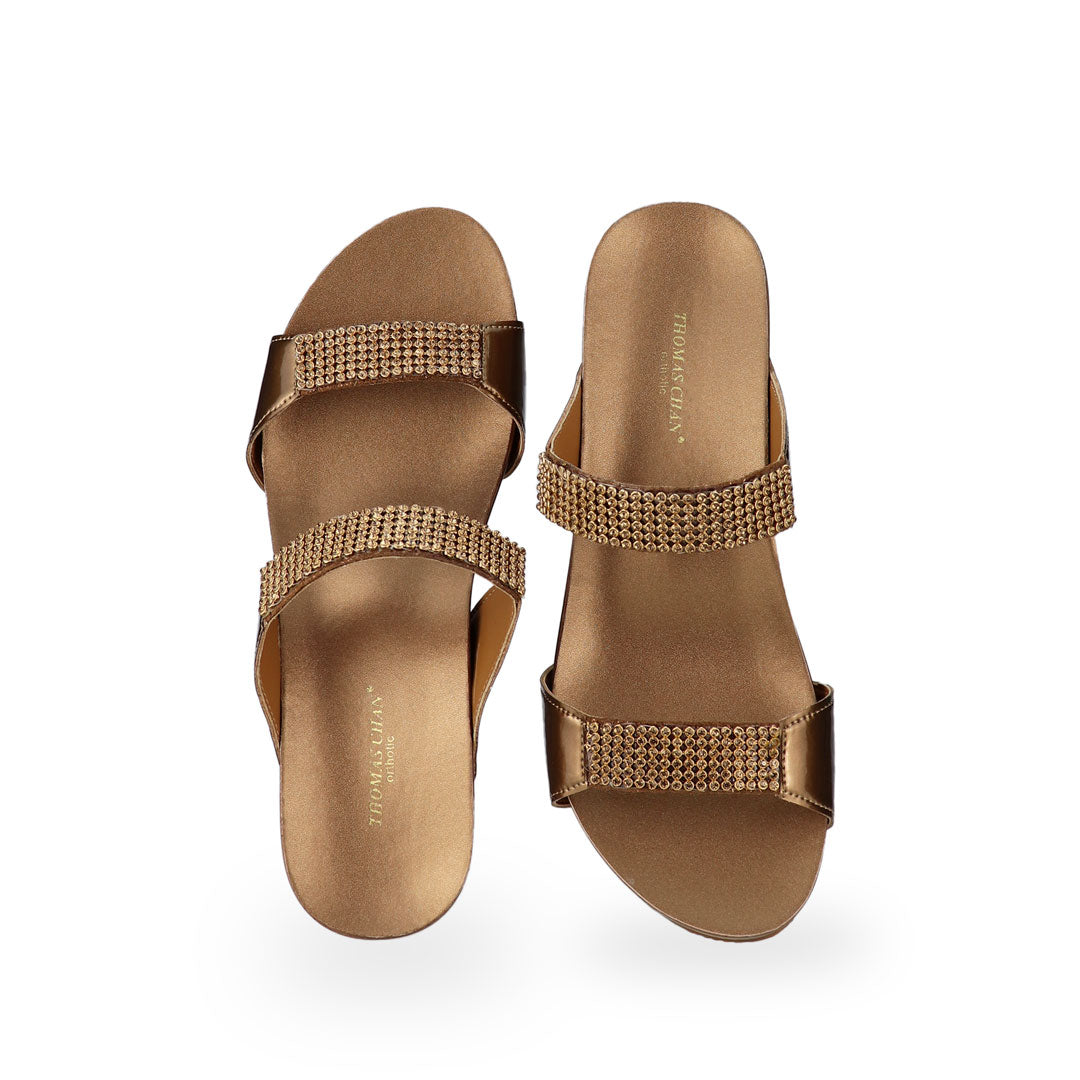 Front view of Thomas Chan bronze colour Multi-Row Diamond Wedge Sandals, adorned with handpicked multi-row diamond straps and Thomas Chan® Orthotic Arch-elegance footbed for stylish comfort.