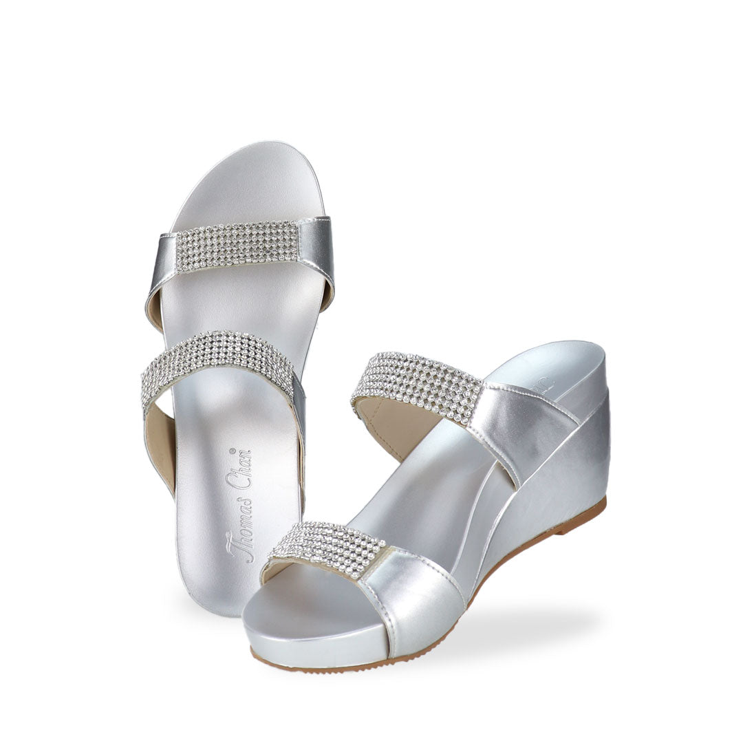 Full view of Thomas Chan silver colour Multi-Row Diamond Wedge Sandals, adorned with handpicked multi-row diamond straps and Thomas Chan® Orthotic Arch-elegance footbed for stylish comfort.