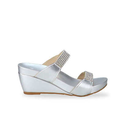 Side view of Thomas Chan silver colour Multi-Row Diamond Wedge Sandals, adorned with handpicked multi-row diamond straps and Thomas Chan® Orthotic Arch-elegance footbed for stylish comfort.