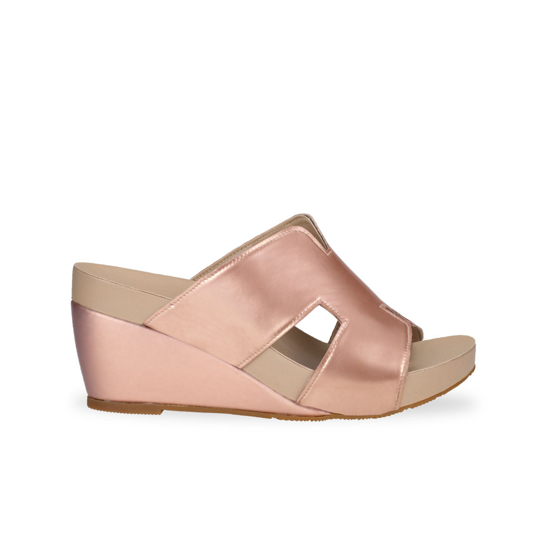 side view of Thomas Chan rose-gold colour simple elegant H strap comfortable wedge sandals