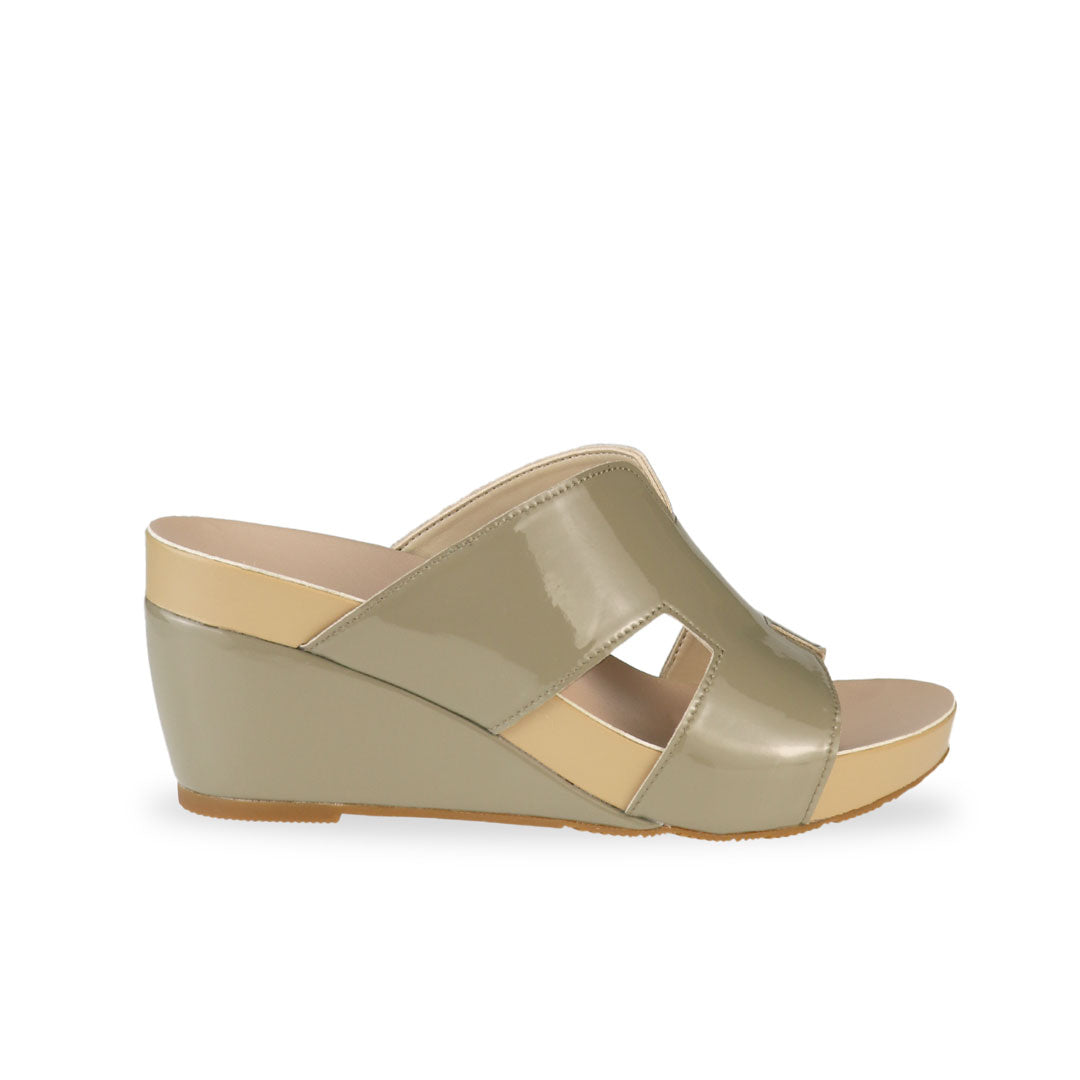 Side view of Thomas Chan ivory green H-strap wedge sandals, featuring a simple, elegant design with comfortable wedges.