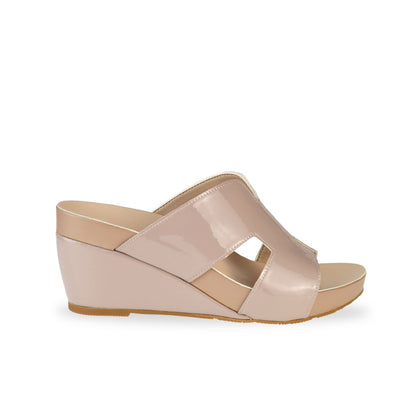 Side view of Thomas Chan light taupe H-strap wedge sandals, featuring a simple, elegant design with comfortable wedges.