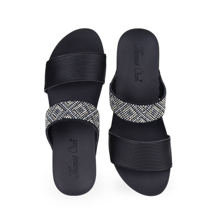 Front view of Thomas Chan black color comfortable boho-inspired strappy low wedge sandals