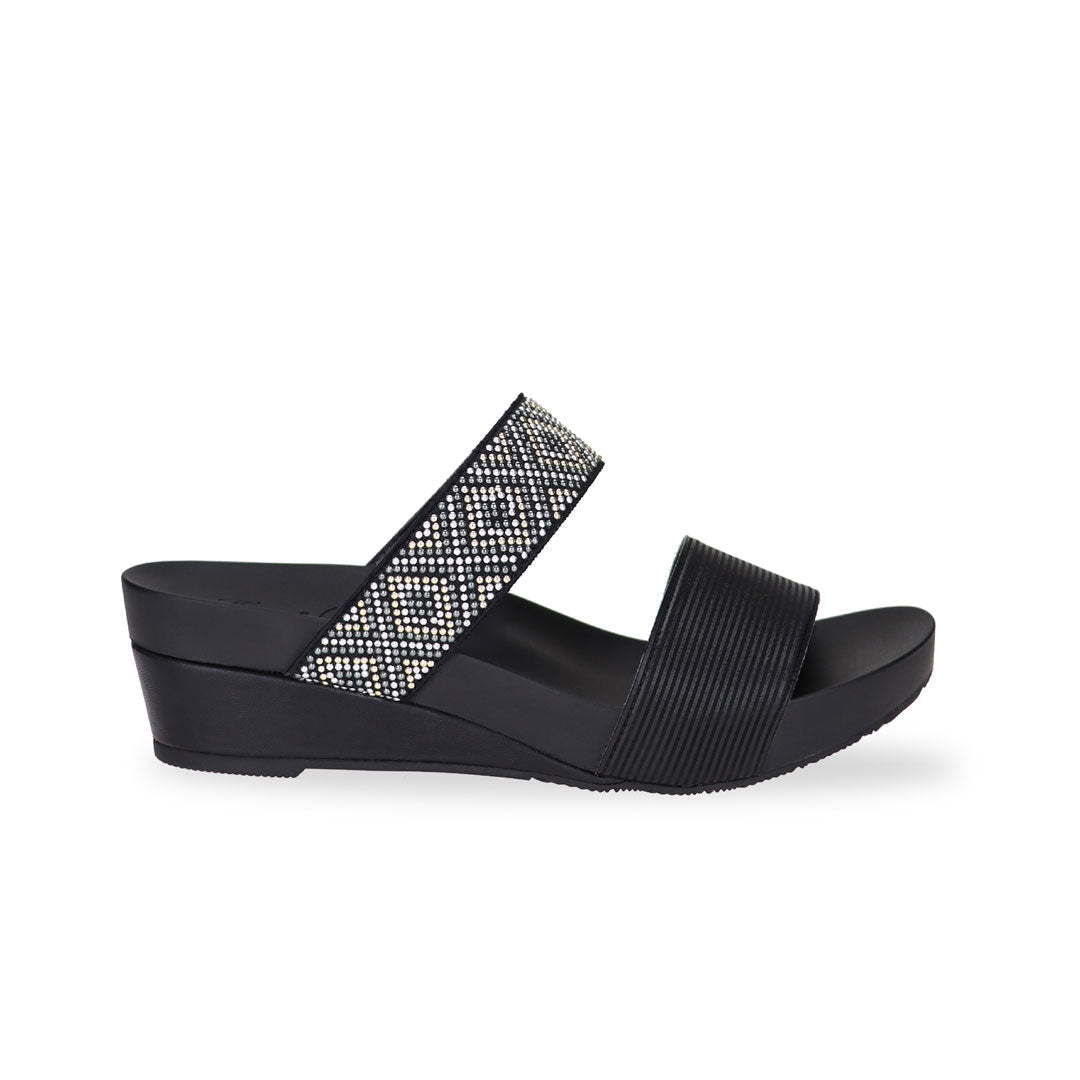 Side view of Thomas Chan black color comfortable boho-inspired strappy low wedge sandals