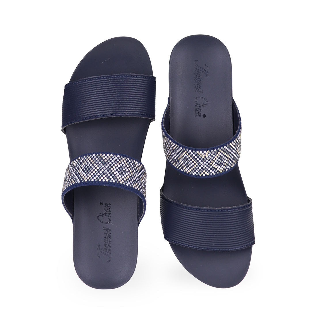 Front view of Thomas Chan navy blue color comfortable boho-inspired strappy low wedge sandals