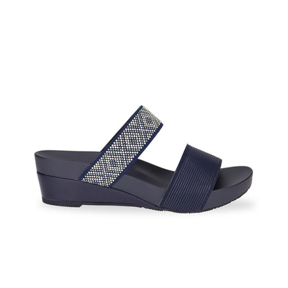 Side view of Thomas Chan navy blue color comfortable boho-inspired strappy low wedge sandals