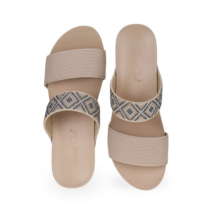 Front view of Thomas Chan sandy beige color comfortable boho-inspired strappy low wedge sandals