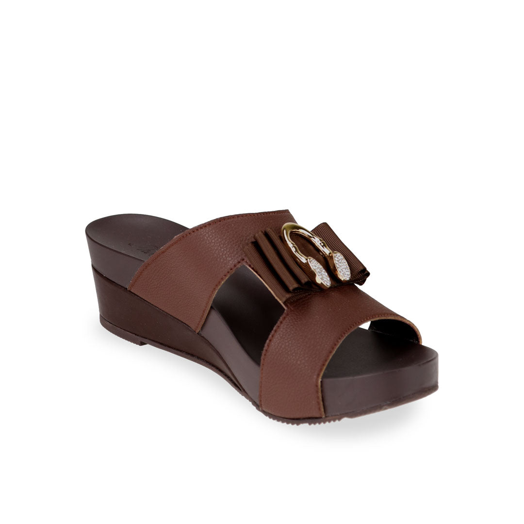 diagonal view of Thomas Chan dark brown colour smiley ribbon buckle low wedge sandal shoes