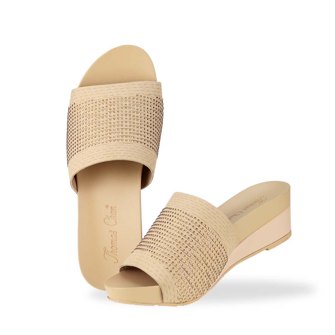 Full view of Thomas Chan's Comfy Elegant Low Wedges in cream, featuring rhinestone accents, a coverage design, and an arch-support footbed.