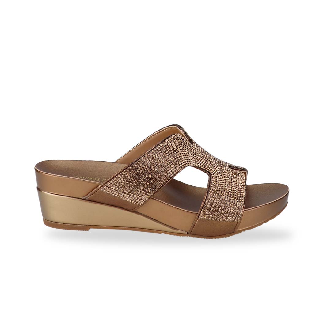 Side view of Thomas Chan's H-strap Glamour Stone Low Wedges in bronze, adorned with glamour rhinestone detailing ,and an arch-support footbed.