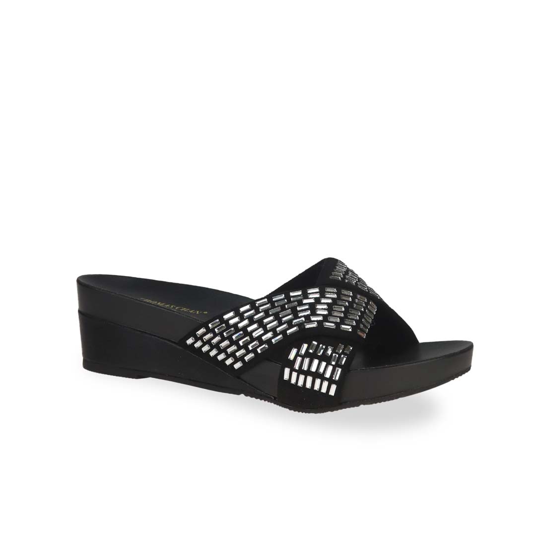 Diagonal view of Thomas Chan's Diamond Crisscross Suede Low Wedges in black colour.