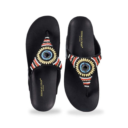 Front view of Thomas Chan's Boho Beaded Flatform Flip-Flops in black, showcasing the boho beaded design and LiteStep flatform footbed. The image highlights the flip-flops' boho beaded accents and casual style.