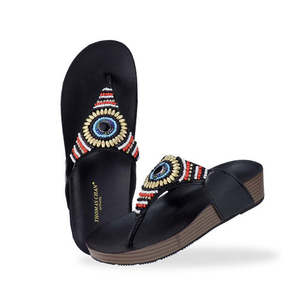 Full view of Thomas Chan's Boho Beaded Flatform Flip-Flops in black, showcasing the boho beaded design and LiteStep flatform footbed. The image highlights the flip-flops' boho beaded accents and casual style.